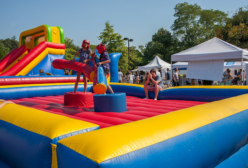 This was a game similar to the Joust event from the American Gladiators show, where competitors tried to knock each other of their platforms with weighted sticks.