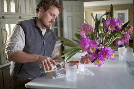 Ryan did some investigation and discovered a good way to remove that build-up. Here he is pouring some distilled vinegar into a container.