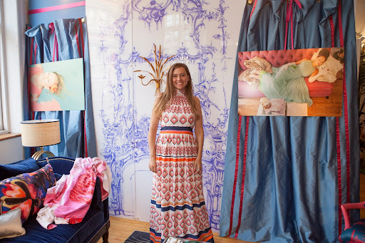 Michelle Workman, who is one of interior design’s top tastemakers, posed in front of the wall art she created by transferring a hand-drawn pattern onto acrylic sheets.