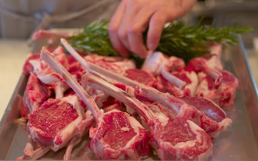 For the seared lamb chops, Pierre's meat purveyor provided meaty chops. Pierre neatly trimmed each one in the French manner, stripping the meat away from the bones, giving an attractive presentation when the food is plated.