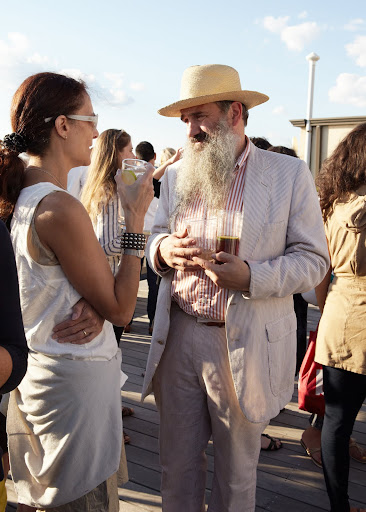Judy Glasser chatting with Fritz Karch. Photo credit: Anna Ross