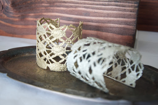 She made these unique lace cuffs by casting vintage lace remnants in various metals and platings, then forming them into wrist-friendly bracelets.