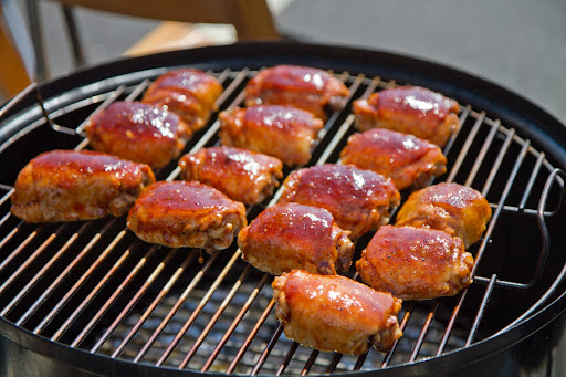 Once the sauce had been applied, the thighs went back on the smoker to give the sauce time to firm up on each piece.