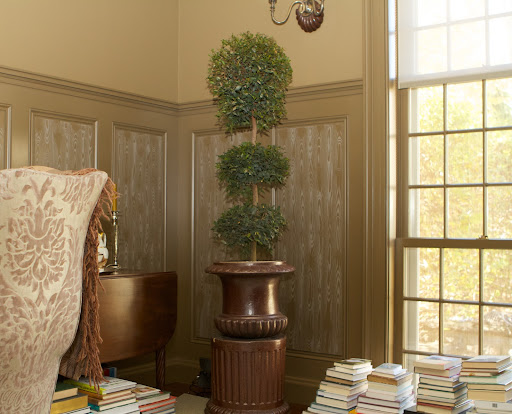 In two corners of the brown room, Ryan placed a couple of beautiful topiaries in some stately urns. They are a type of brush cherry, or syzygium, a member of the myrtle family.