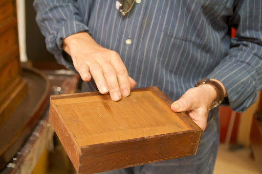 You can often tell the quality of furniture by looking at how its drawers were made. With dovetail joints, joining the sides of the drawer to the front, this is a good piece. The dovetail joint is noted for its tensile strength, or resistance to being pulled apart.