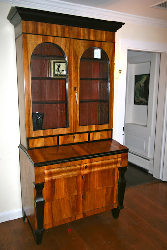 The ebony and multiple wood inlay Biedarmeier secretaire was tagged at $4,000.