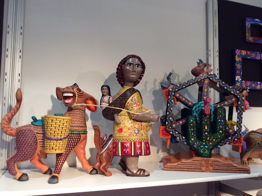 Mexico has 26 talented artisans represented at the Market. This is artwork from Crafts Cruz, known for their whimsy.