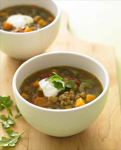 Lentil and Sweet-Potato Stew - Lentils are a good choice for making vegetarian stews, since they don't require presoaking and take much less time to cook than other legumes. Here they are combined with sweet potatoes and other vegetables in a dish with Indian flavors.
