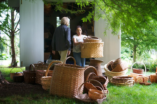 I asked my housekeeper, Sanu Sherpa, to help me remove every single basket and place them on the lawn.