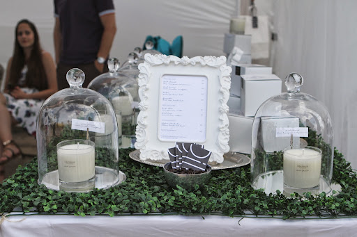 She creates signature scent combinations like magnolia, marshmallow, tomato, and even tobacco - Very inventive and inviting!