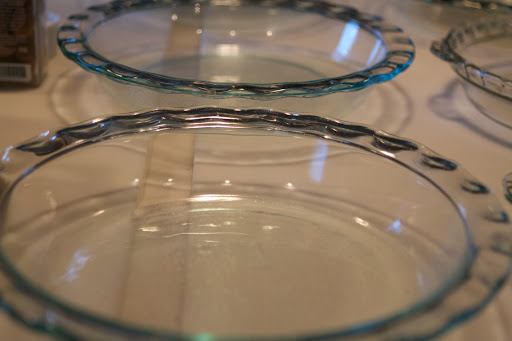 I like to bake pies in Pyrex dishes because I can see how the bottom crust is baking. I coated these with a thin coat of Pam.