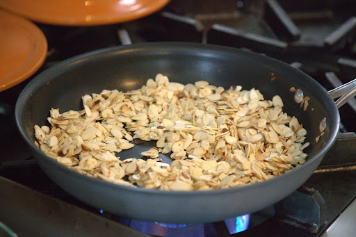 Blanched slivered almonds were sauteed in olive oil until slightly browned.