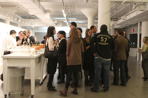 Dan had a nice and steady turnout. The really tall fellow is Adam Thompson, sports editor of The Wall Street Journal.