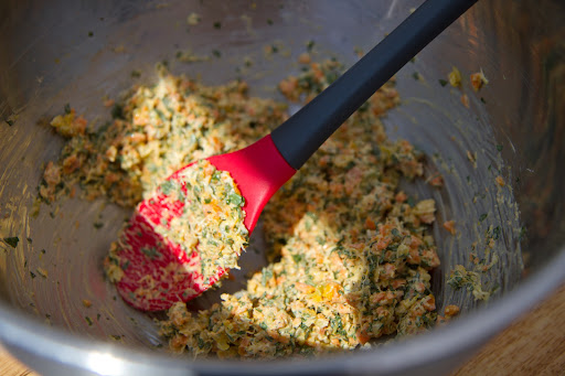 Making the crab meat stuffing - They chose a lump crab, since it provides bigger, meatier pieces, even after the rigors of mixing with other ingredients.