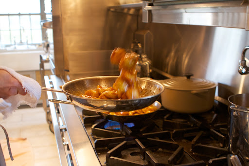 The apples were tossed as they gently browned.