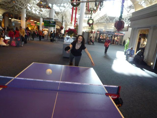 Molly Bloom - Copy editor - I went to Utah with my boyfriend. Here I am playing Ping-Pong during our layover at the Milwaukee Airport on December 24th.
