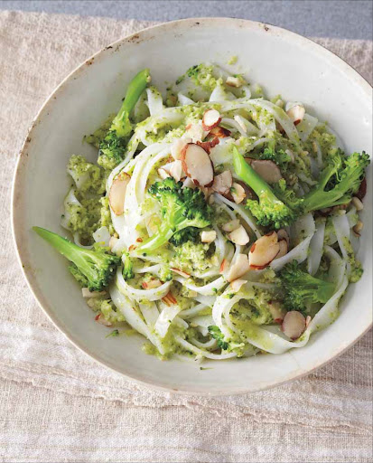 Rice Noodles with Broccoli Pesto - Broccoli, basil, and almonds combine to make a no-cheese pesto for rice noodles, with some of the florets for a topping. Rice noodles are especially popular in Southeast Asian cooking and offer a gluten-free alternative to traditional pasta.