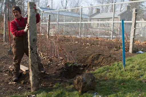 Chhiring had to determine how long the replacement posts needed to be, as the granite surplus pile has varying lengths.