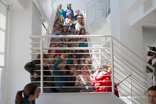 All the kids sat on the stairs to record a big hello to me. As soon as the photo was taken they were ready to head up to the rooftop to do some gardening!