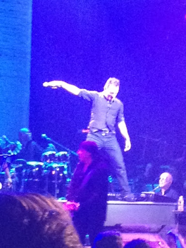 In addition to his customary group, including Steve Van Zandt (foreground), the Boss was backed by five horns and three vocalists.