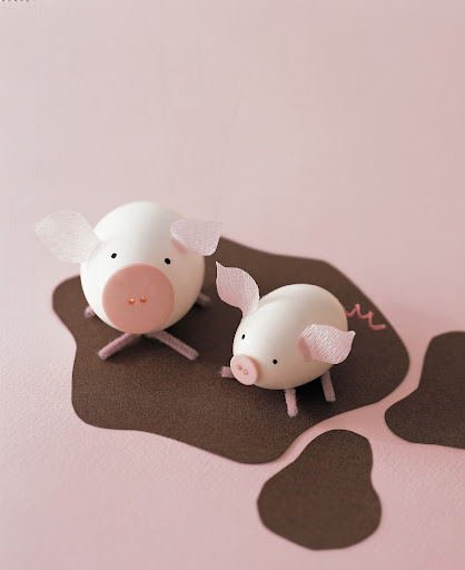 Egg Pigs: Did you know you can use hollowed-out eggshells and a few crafts supplies to make a barnyard full of pigs, cows, and chickens?
