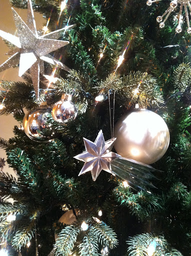 The 3-D glitter star ornaments are made with mat board and glitter. You can find the templates for these and other star power ornaments at http://www.marthastewart.com/star-projects