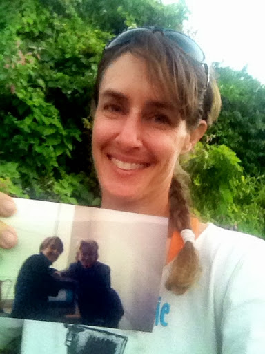 This is Christina holding an old photo of the two of us when she was a graphic designer in the art department of MSLO.