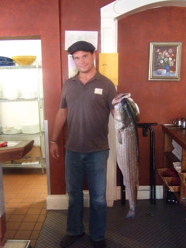 Even though we’re hundreds of miles from the ocean, we can still get fresh seafood. This is Job Yacubian delivering a 25lb. sea bass, which he caught off of Nantucket Island.