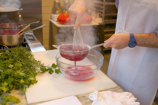 After cooking for several minutes, the cranberry mixture was passed through a fine sieve to remove the solids.
