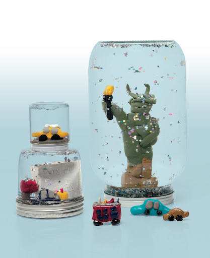 Snow Globes: These homemade snow globes are a perfect way to display and preserve a young artist’s masterpieces molded from bakeable clay.