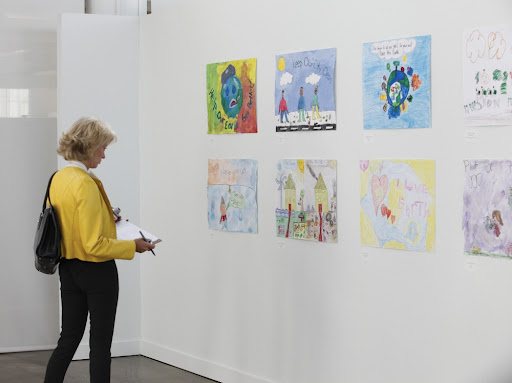 Lisa reviewing some of the posters