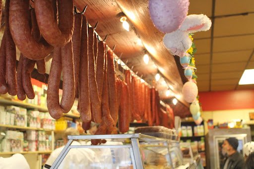 Upon entering the shop, you immediately take in the aroma of expertly seasoned and hickory smoked Polish kielbasa, ham, bacon, and various other meats.