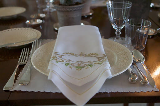 My housekeeper, Laura Acuna chose beautiful embroidered napkins and set the table with antique Wedgwood china and mixed silver utensils.