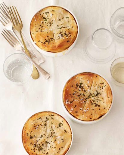 Vegetable-Barley Potpies - Filled with a hearty mix of mushrooms, barley, and white beans, these potpies are just as satisfying as more traditional chicken versions. Phyllo dough offers a quicker–and delectably flaky–alternative to a pâté brisée top.