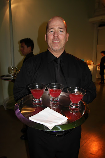 The Pomtini is made with pomegranate juice, grapefruit juice, and vodka and is garnished with pomegranate arils.