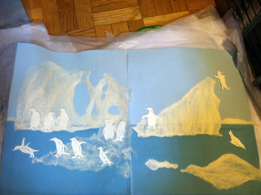 Before painting the penguins, I arranged them in various ways along the icebergs.
