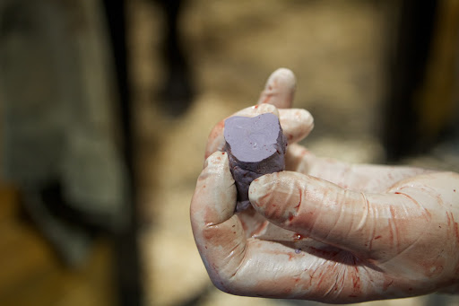 The impression material was trimmed to fit.